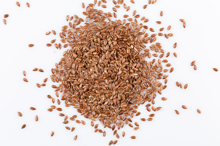 Ð¡lose up of flax seeds isolated on white backgroundの写真素材