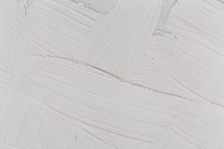 Gray Brushed white canvas or wall texture backgroundの写真素材