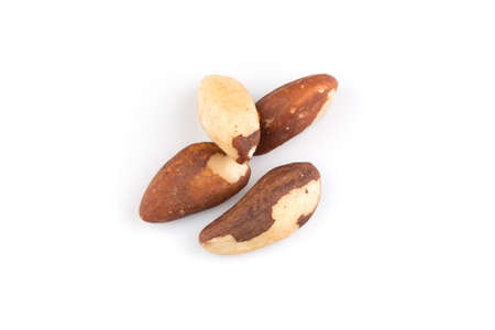 Brazil nuts on white background close up