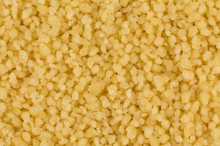Top view of couscous as background textureの写真素材