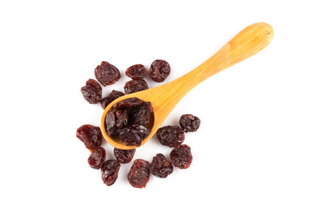 pieces of dried cherry isolated on white backgroundの写真素材