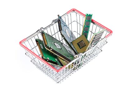 shopping trolley filled with computer stuff on white background
