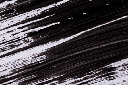 Black paint isolated on white paper background