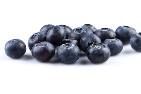 Group of fresh juisy blueberries isolated on white backgroundの写真素材
