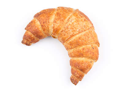 Fresh and tasty croissant over white backgroundの写真素材