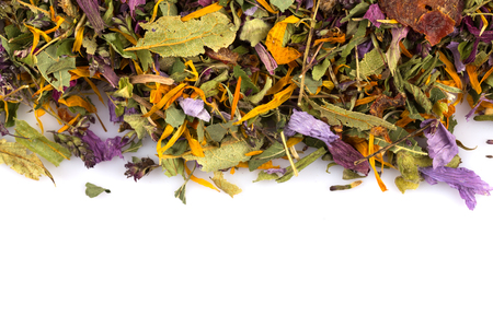 Dried herbal flower tea leaves over white backgroundの写真素材