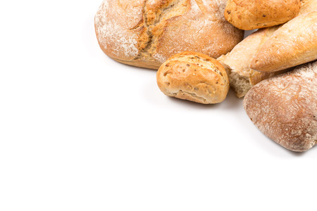 Composition with bread, buns and rolls isolated on white backgroundの写真素材