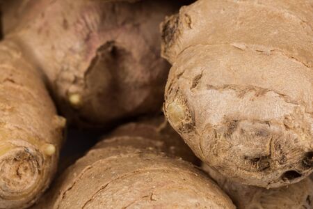 heap of ginger root close up for background