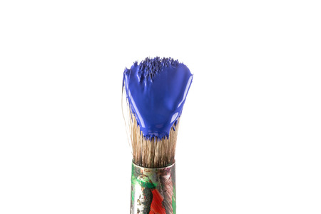 Brush with blue paint isolated on white backgroundの写真素材