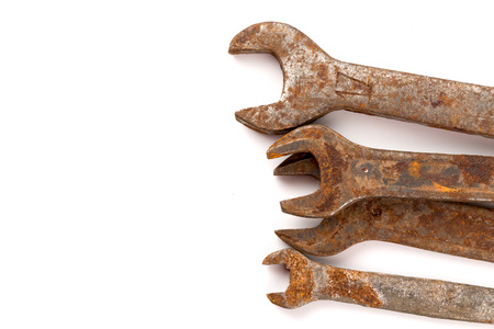 old rusty spanners isolated on white backgroundの写真素材