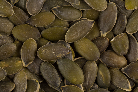 Pile of fresh dry pumpkin seeds close upの写真素材