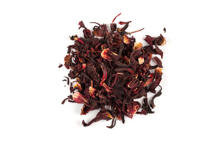 Heap of aromatic Hibiscus tea (karkade), isolated on white backgroundの写真素材