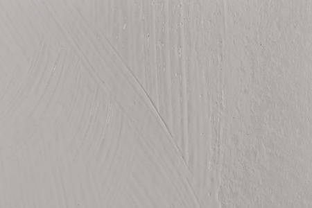 White paint on paper close up image shot backgroundの写真素材