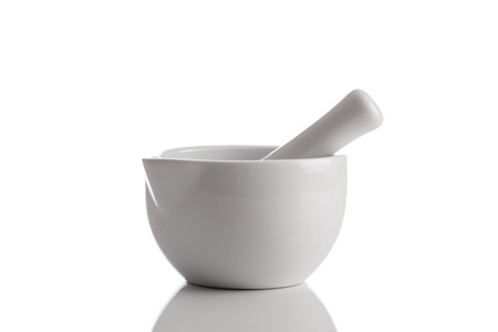 Ceramic mortar and pestle on a white backgroundの写真素材