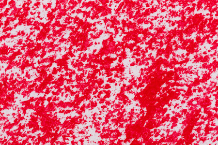 Red crayon draw on a white paperの写真素材