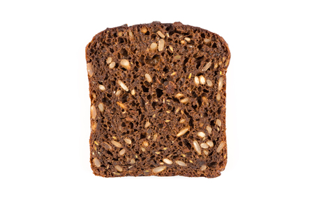 Dark rye bread with sunflower seeds on a white backgroundの写真素材