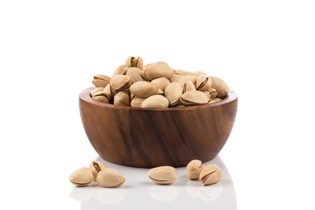 pistachio nut close up on white background isolatedの写真素材