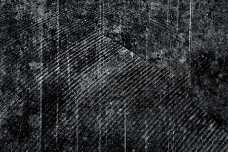 Old grungy scratched stone wall as abstract background textureの写真素材