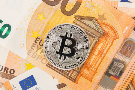 Silver bitcoin Euro background. Bitcoin cryptocurrency coinの写真素材