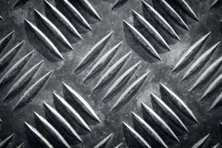 Metal floor plate with diamond pattern texture for backgroundの写真素材