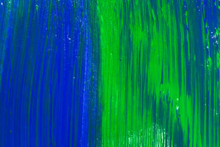 green blue stroke of the paint brush on white paperの写真素材