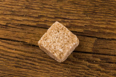 brown sugar on an old wooden table