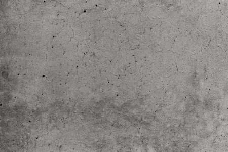 Old dirty moldy concrete wall as abstract background textureの写真素材