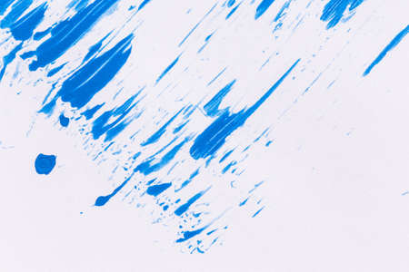 acrylic paint texture background blue color on white paper. Brush stroke. Hand made