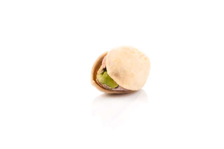 pistachio nut in shell close up isolated on white background