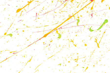 Colorful ink splashes. Paint splatters on bright material. Multi color dots. Watercolor on white...