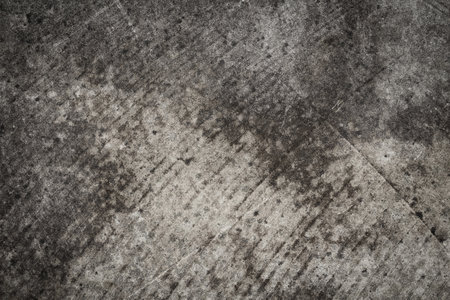 Old grungy scratched concrete wall as abstract background textureの写真素材