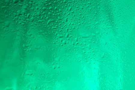 Drops of water droplets on glass raindrops on clear windowの写真素材