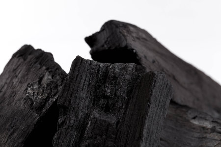 hardwood charcoal coal Isolated on white background
