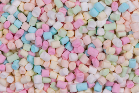 Colorful marshmallows as background, macro. Fluffy marshmallows texture close up.