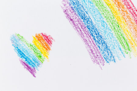 Rainbow heart crayon drawing texture photo for backgroundの写真素材