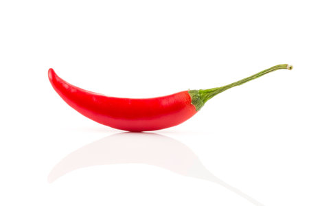 Red chili pepper isolated on white backgroundの写真素材