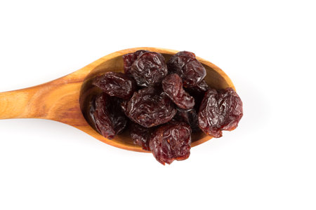 pieces of dried cherry isolated on white backgroundの写真素材