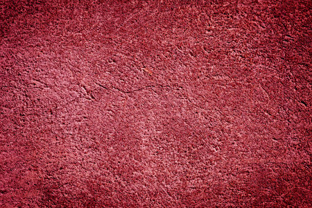 Red stone grunge background wall dirty textureの写真素材