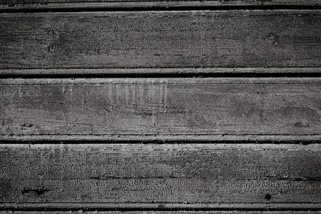 Old wooden painted and chipping paint texture backgroundの写真素材