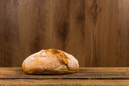 Close up of white bread over wooden backgroundの写真素材