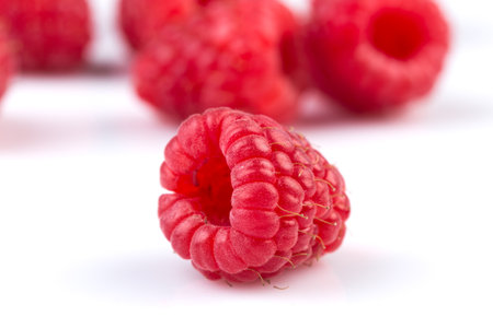 Fresh raspberry isolated on a white backgroundの写真素材