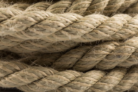 Close-up of an old frayed boat rope as a background