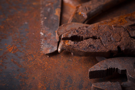 Dirty set of hand old rusty tools. Equipment for locksmith and metalworking shopの写真素材