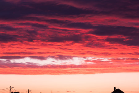 Bright vibrant sunset sky backgroundの写真素材