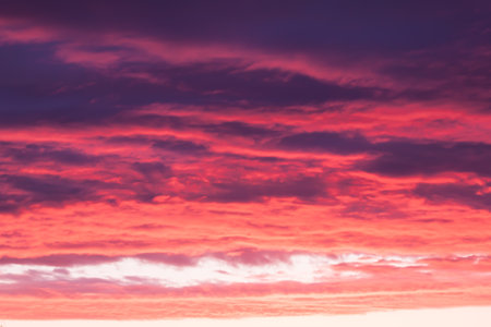 Bright vibrant sunset sky backgroundの写真素材