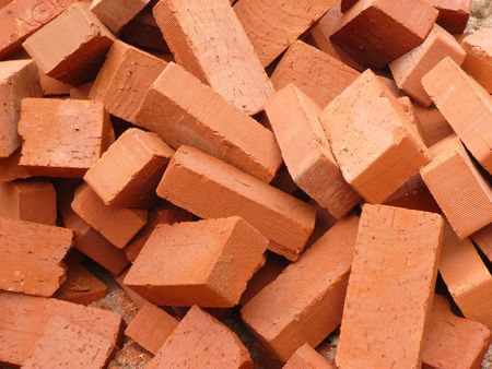 heap of red brick at day