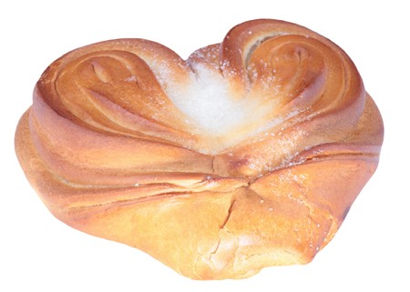 twist bun with heart shape on white の写真素材