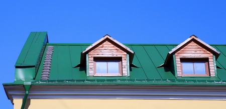 green roof on on house with wood garretの写真素材