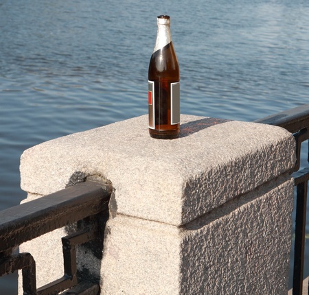 bottle on fence stone  columnの写真素材
