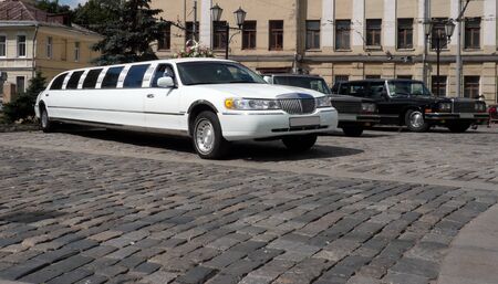 white wedding limousine at dry sunny dayの写真素材